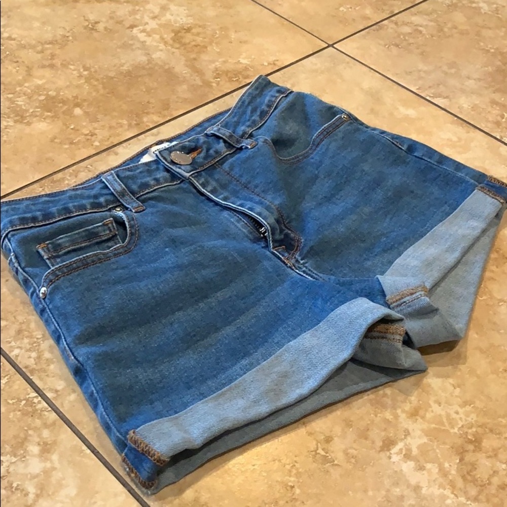 Dark denim jean shorts. Great quality.